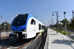 Early afternoon westbound getting ready to depart Redlands University Station 